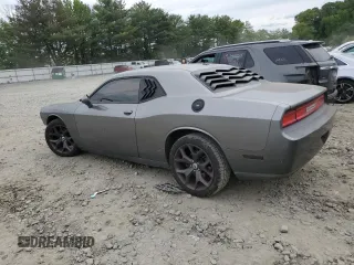 2011 Dodge Challenger z VIN 2B3CJ4DG5BH570472, wystawiony jako Copart lot #58479265 z przebiegiem Nie podano mil oraz Szkoda całkowita • Salvage title. Historia ofert i sprzedaży dostępna na DreamBid. Obrazek 2.