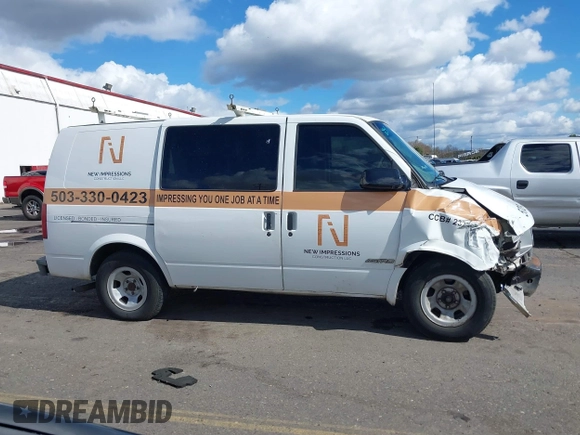 2000 Chevrolet Astro Cargo with VIN 1GCDM19W1YB217561, listed as a IAAI auction lot 41805659 with Not Provided miles. Bid and sale history available at carsss.com. Image 13.