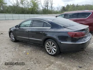 2013 Volkswagen CC Executive z VIN WVWGU7AN0DE529415, wystawiony jako Copart lot #56127135 z przebiegiem 131 345 mil mil oraz Tytuł czysty. Historia ofert i sprzedaży dostępna na DreamBid. Obrazek 2.