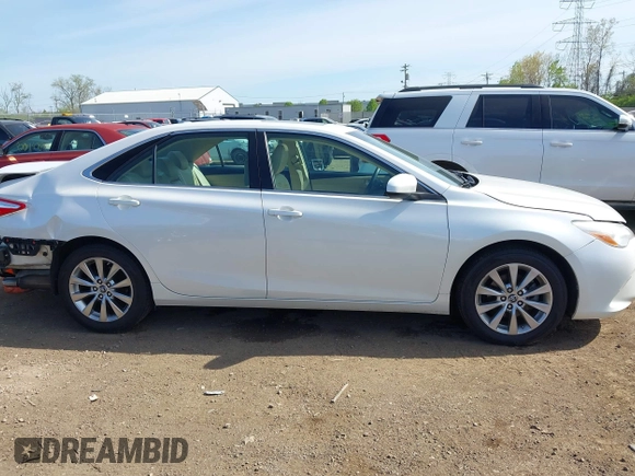 2015 Toyota Camry XLE with VIN 4T1BF1FK1FU977554, listed as a IAAI auction lot 42083589 with 104,811 mi miles and . Bid and sale history available at DreamBid. Image 14.