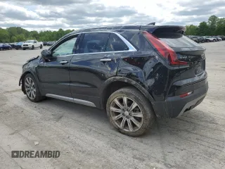 2020 Cadillac XT4 FWD Premium Luxury with VIN 1GYFZCR46LF113499, listed as a Copart auction lot 57534205 with 64,859 mi miles and Salvage title. Bid and sale history available at DreamBid. Image 2.