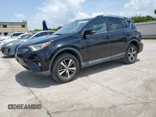 2018 Toyota RAV4 XLE with VIN 2T3WFREV2JW433186, listed as a Copart auction lot 61008705 with 57,310 mi miles and Salvage title. Bid and sale history available at DreamBid. Image 1.