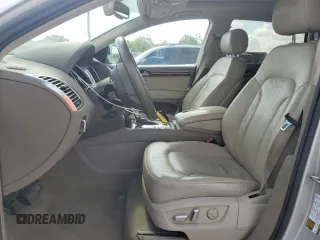 2013 Audi Q7 Prestige с VIN WA1VMAFE0DD003704, выставлен на аукционе Copart как лот 61551745 с пробегом 196 843 миль миль и Чистый • Clean title. История ставок и продаж доступна на DreamBid. Изображение 7.