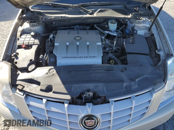2007 Cadillac DTS Performance z VIN 1G6KD57907U187194, wystawiony jako Copart lot #79310374 z przebiegiem 108 144 mil mil oraz Szkoda całkowita • Salvage title. Historia ofert i sprzedaży dostępna na DreamBid. Obrazek 11.
