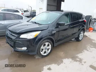 2016 Ford Escape SE z VIN 1FMCU0G73GUB60781, wystawiony jako IAAI lot #42149783 z przebiegiem 135 015 mil mil oraz . Historia ofert i sprzedaży dostępna na DreamBid. Obrazek 2.