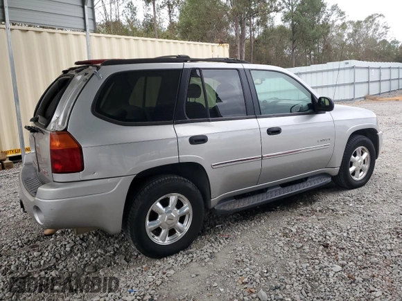 2006 GMC Envoy SLT with VIN 1GKDS13S062186025, listed as a Copart auction lot 79041904 with 220,053 mi miles and Salvage Title. Bid and sale history available at carsss.com. Image 3.