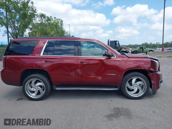 2020 GMC Yukon SLT z VIN 1GKS1BKC4LR242383, wystawiony jako IAAI lot #42104912 z przebiegiem 55 017 mil mil oraz . Historia ofert i sprzedaży dostępna na DreamBid. Obrazek 13.