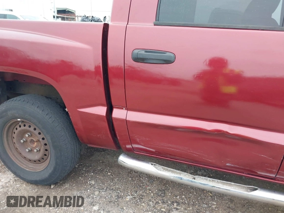 2006 Dodge Dakota SLT with VIN 1D7HE48KX6S598831, listed as a IAAI auction lot 41292884 with 173,181 mi miles and . Bid and sale history available at carsss.com. Image 18.