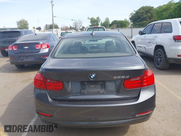 2014 BMW 3 Series 328d with VIN WBA3D3C50EK153111, listed as a IAAI auction lot 41980101 with 127,390 mi miles and . Bid and sale history available at carsss.com. Image 16.