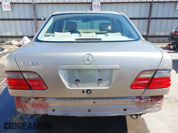 2002 Mercedes-Benz E-Class with VIN WDBJF65J42B394017, listed as a IAAI auction lot 41706917 with 188,883 mi miles. Bid and sale history available at carsss.com. Image 6.