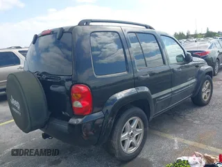 2003 Jeep Liberty Limited with VIN 1J4GK58K13W719457, listed as a IAAI auction lot 42088672 with 179,214 mi miles and . Bid and sale history available at carsss.com. Image 4.