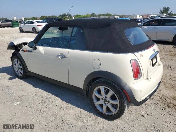 2008 MINI Cooper Convertible with VIN WMWRF335X8TG18063, listed as a Copart auction lot 56055084 with 71,474 mi miles and Salvage Title. Bid and sale history available at carsss.com. Image 2.