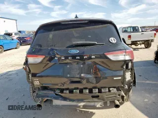 2020 Ford Escape SE z VIN 1FMCU0G62LUA54114, wystawiony jako Copart lot #58015855 z przebiegiem 106 857 mil mil oraz Szkoda całkowita • Salvage title. Historia ofert i sprzedaży dostępna na DreamBid. Obrazek 6.