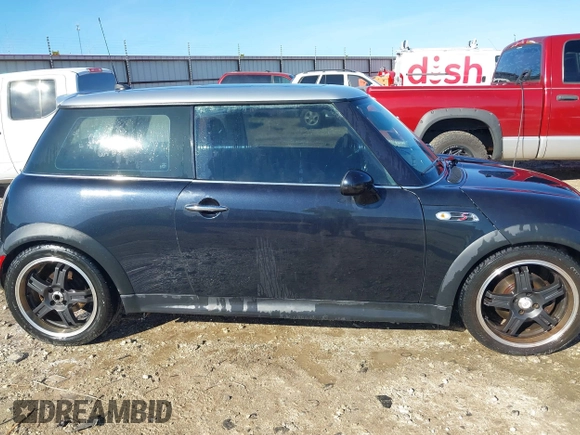 2006 MINI Hardtop S with VIN WMWRE33546TJ34712, listed as a IAAI auction lot 41144701 with 230,006 mi miles and . Bid and sale history available at DreamBid. Image 13.