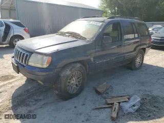 2003 Jeep Grand Cherokee Limited with VIN 1J8GW58N63C592607, listed as a Copart auction lot 52824825 with 0 mi miles and Clean Title. Bid and sale history available at carsss.com. Image 1.