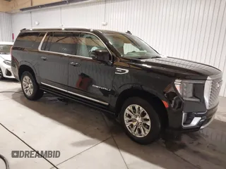 2023 GMC Yukon XL Denali with VIN 1GKS2JKL1PR187338, listed as a IAAI auction lot 41213131 with 25,336 mi miles. Bid and sale history available at carsss.com. Image 1.