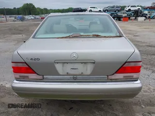 1999 Mercedes-Benz S 320/430/500 z VIN WDBGA43G3XA425985, wystawiony jako IAAI lot #42376647 z przebiegiem 217 736 mil mil oraz . Historia ofert i sprzedaży dostępna na DreamBid. Obrazek 14.