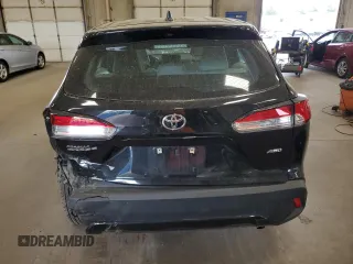 2023 Toyota Corolla Cross L with VIN 7MUAAABG8PV049431, listed as a Copart auction lot 56982055 with 20,275 mi miles and Salvage title. Bid and sale history available at DreamBid. Image 6.