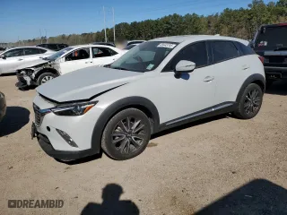 2018 Mazda CX-3 Grand Touring with VIN JM1DKFD77J0310587, listed as a Copart auction lot 49443755 with 70,897 mi miles and Salvage Title. Bid and sale history available at carsss.com. Image 1.