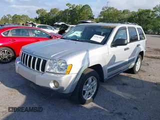 2005 Jeep Grand Cherokee Laredo with VIN 1J8GS48K35C591154, listed as a IAAI auction lot 42107302 with 196,237 mi miles and . Bid and sale history available at DreamBid. Image 2.