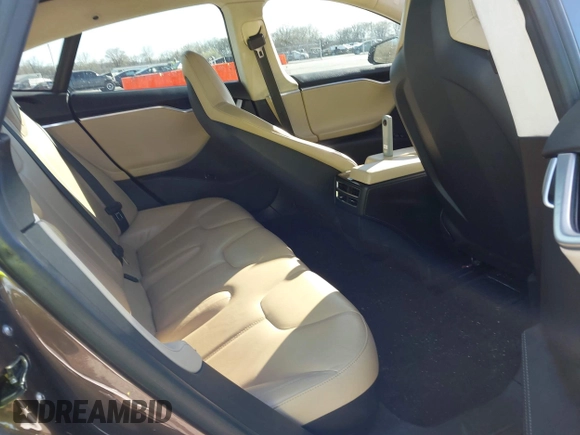 2014 Tesla Model S 60 with VIN 5YJSA1H17EFP33275, listed as a IAAI auction lot 41778167 with 202,749 mi miles and . Bid and sale history available at DreamBid. Image 8.