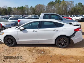 2018 Ford Fusion SE with VIN 3FA6P0H76JR227014, listed as a IAAI auction lot 41901203 with 147,454 mi miles and . Bid and sale history available at DreamBid. Image 14.