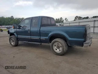 1999 Ford F-250 XL with VIN 1FTNX20FXXEA40858, listed as a Copart auction lot 63296925 with 368,565 mi miles and Salvage title. Bid and sale history available at DreamBid. Image 2.