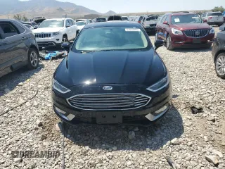 2017 Ford Fusion Hybrid SE with VIN 3FA6P0LU1HR266939, listed as a Copart auction lot 61018305 with 121,293 mi miles and Salvage title. Bid and sale history available at DreamBid. Image 5.