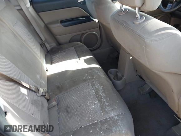 2011 Jeep Patriot Sport z VIN 1J4NT1GA6BD203899, wystawiony jako IAAI lot #41978150 z przebiegiem Nie podano mil oraz . Historia ofert i sprzedaży dostępna na DreamBid. Obrazek 8.
