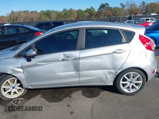 2019 Ford Fiesta SE with VIN 3FADP4EJ0KM107058, listed as a IAAI auction lot 40979683 with 116,854 mi miles. Bid and sale history available at carsss.com. Image 14.