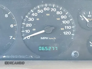 1999 Jeep Grand Cherokee Limited with VIN 1J4GW68N3XC770468, listed as a IAAI auction lot 41793600 with 65,277 mi miles. Bid and sale history available at carsss.com. Image 15.