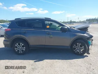 2018 Toyota RAV4 LE with VIN JTMZFREV7JJ207270, listed as a IAAI auction lot 41853828 with 89,179 mi miles. Bid and sale history available at carsss.com. Image 14.