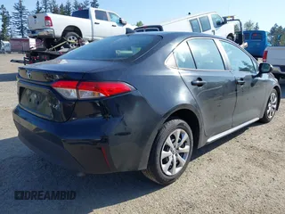 2023 Toyota Corolla LE with VIN 5YFB4MDE9PP032701, listed as a IAAI auction lot 42111425 with 29,744 mi miles. Bid and sale history available at carsss.com. Image 4.