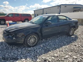 1999 Pontiac Grand Am SE2 with VIN 1G2NE52E2XM732523, listed as a Copart auction lot 75420684 with 124,110 mi miles and Salvage Title. Bid and sale history available at carsss.com. Image 1.