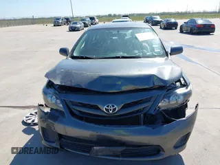 2012 Toyota Corolla L with VIN 2T1BU4EE9CC831743, listed as a IAAI auction lot 41870966 with 166,548 mi miles. Bid and sale history available at carsss.com. Image 12.