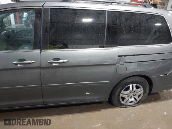 2007 Honda Odyssey EX with VIN 5FNRL38427B052619, listed as a IAAI auction lot 41727004 with 213,300 mi miles. Bid and sale history available at carsss.com. Image 6.