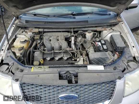 2006 Ford Freestyle SEL z VIN 1FMDK05136GA46155, wystawiony jako Copart lot #57254025 z przebiegiem Nie podano mil oraz Szkoda całkowita • Salvage title. Historia ofert i sprzedaży dostępna na DreamBid. Obrazek 12.