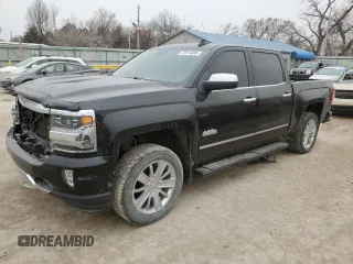 2016 Chevrolet Silverado 1500 High Country with VIN 3GCUKTEC8GG252049, listed as a Copart auction lot 47075095 with 127,206 mi miles and Salvage Title. Bid and sale history available at DreamBid. Image 1.