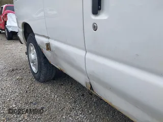 2012 Ford Econoline Cargo Commercial with VIN 1FTNE1EW0CDB10750, listed as a IAAI auction lot 41939696 with 180,042 mi miles. Bid and sale history available at carsss.com. Image 20.