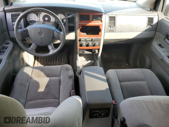 2006 Dodge Durango z VIN 1D4HD48K26F148258, wystawiony jako Copart lot #47018825 z przebiegiem Nie podano mil oraz Szkoda całkowita • Salvage title. Historia ofert i sprzedaży dostępna na DreamBid. Obrazek 8.