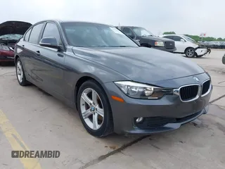 2013 BMW 3 Series 320i with VIN WBA3B1C53DK128602, listed as a IAAI auction lot 41952771 with 103,564 mi miles and . Bid and sale history available at carsss.com. Image 1.