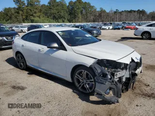 2020 BMW 2 Series M235i xDrive with VIN WBA13AL07L7F58999, listed as a Copart auction lot 77858084 with 19,833 mi miles and Salvage Title. Bid and sale history available at carsss.com. Image 4.
