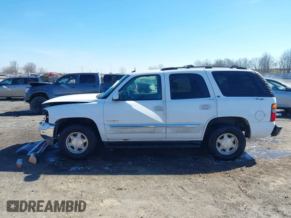 2003 GMC Yukon SLT with VIN 1GKEC13Z13J197955, listed as a IAAI auction lot 41586841 with 208,752 mi miles. Bid and sale history available at carsss.com. Image 14.