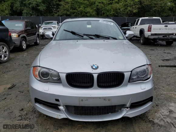 2011 BMW 1 Series 135i with VIN WBAUC9C56BVM09045, listed as a Copart auction lot 73316874 with 125,679 mi miles and Salvage Title. Bid and sale history available at carsss.com. Image 5.