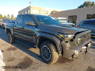 2024 Toyota Tacoma 4WD SR5 with VIN 3TMLB5JN3RM046513, listed as a IAAI auction lot 41231528 with 7,091 mi miles. Bid and sale history available at carsss.com. Image 1.