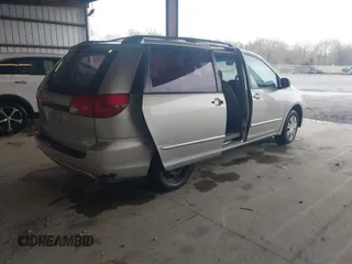 2004 Toyota Sienna CE with VIN 5TDZA23C74S161390, listed as a IAAI auction lot 42025128 with 206,796 mi miles. Bid and sale history available at carsss.com. Image 4.