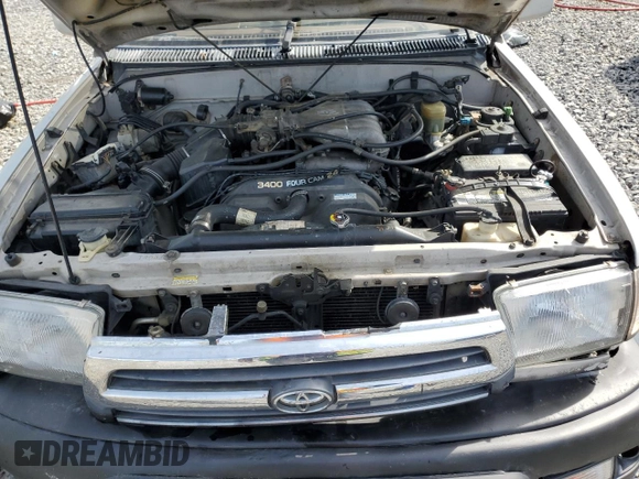 1999 Toyota 4Runner Limited with VIN JT3GN87R5X0115971, listed as a Copart auction lot 50742105 with 323,635 mi miles and Salvage Title. Bid and sale history available at DreamBid. Image 12.