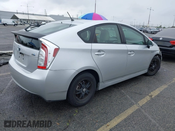 2013 Toyota Prius One with VIN JTDKN3DU4D5670233, listed as a IAAI auction lot 42065164 with 193,103 mi miles and . Bid and sale history available at DreamBid. Image 4.