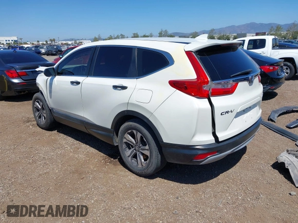 2017 Honda CR-V LX with VIN 2HKRW6H34HH219033, listed as a IAAI auction lot 41948876 with 105,813 mi miles. Bid and sale history available at carsss.com. Image 3.