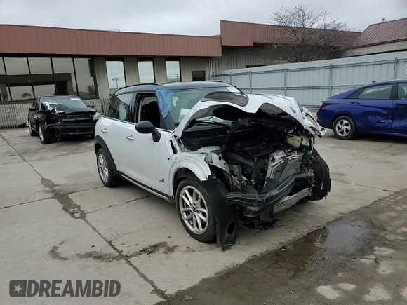 2015 MINI Countryman S with VIN WMWZC5C54FWP45274, listed as a Copart auction lot 47877695 with Not Provided miles and Salvage Title. Bid and sale history available at DreamBid. Image 12.